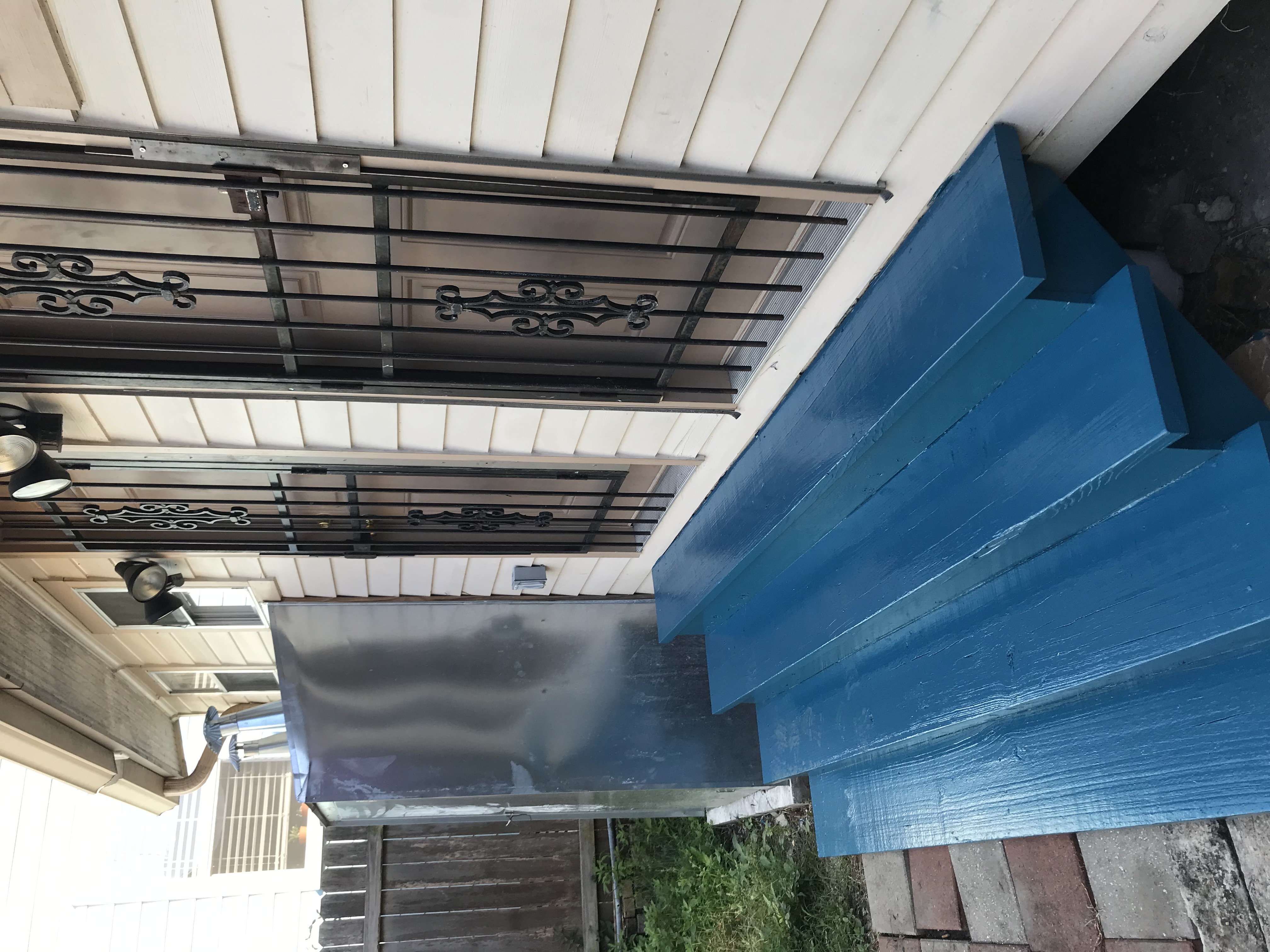 Blue painted porch steps