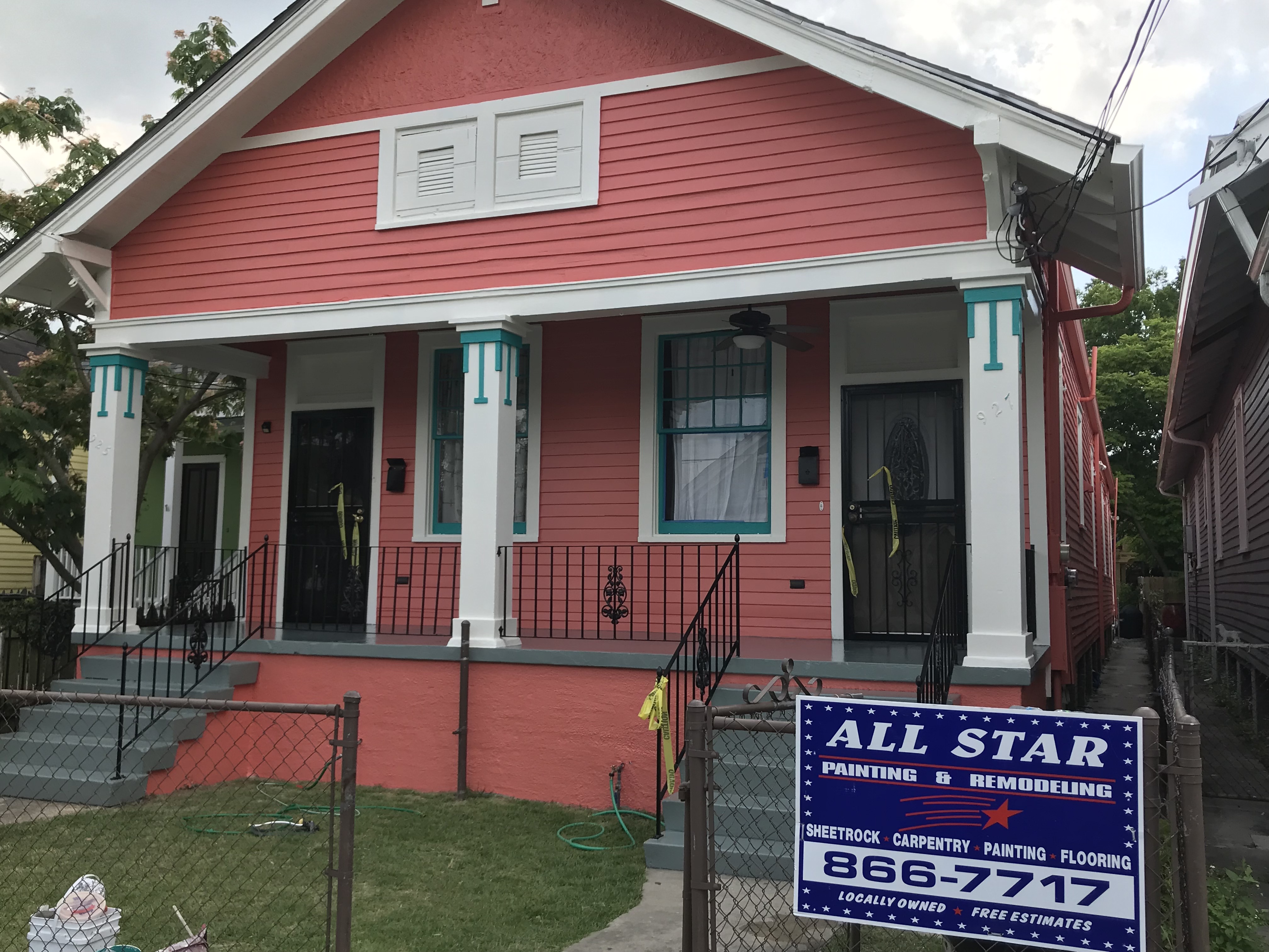 Beautiful coral NOLA home painted by All Star Construction